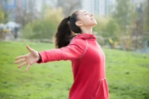 Healthy woman feeling energized representing strong immune and nervous system connection