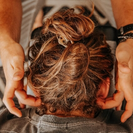 Dr. Tony Miller adjusting patient using NetworkSpinal technique