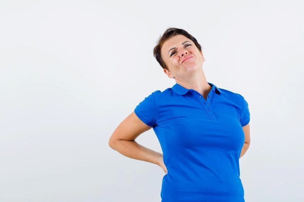 Mature woman suffering from backache