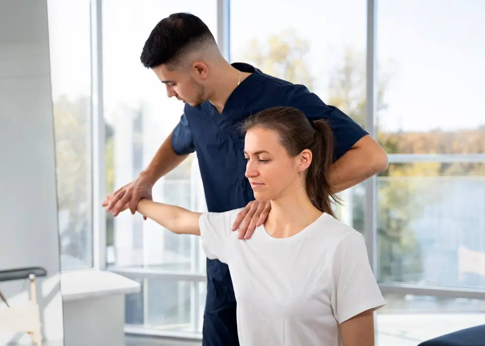 Chiropractor treating patient recovering from car accident injury