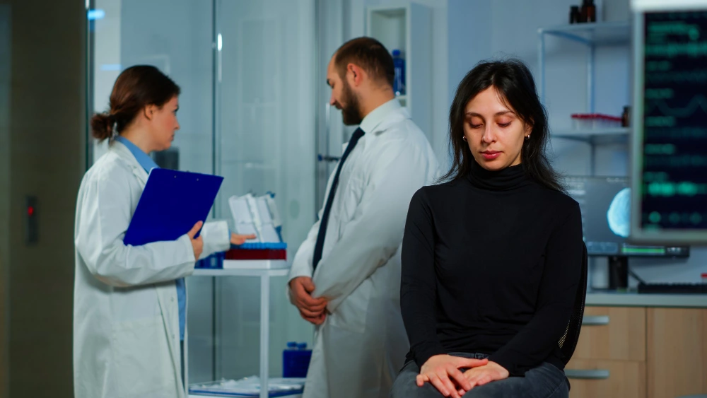 Doctor explaining brain and nervous system function to a patient during consultation