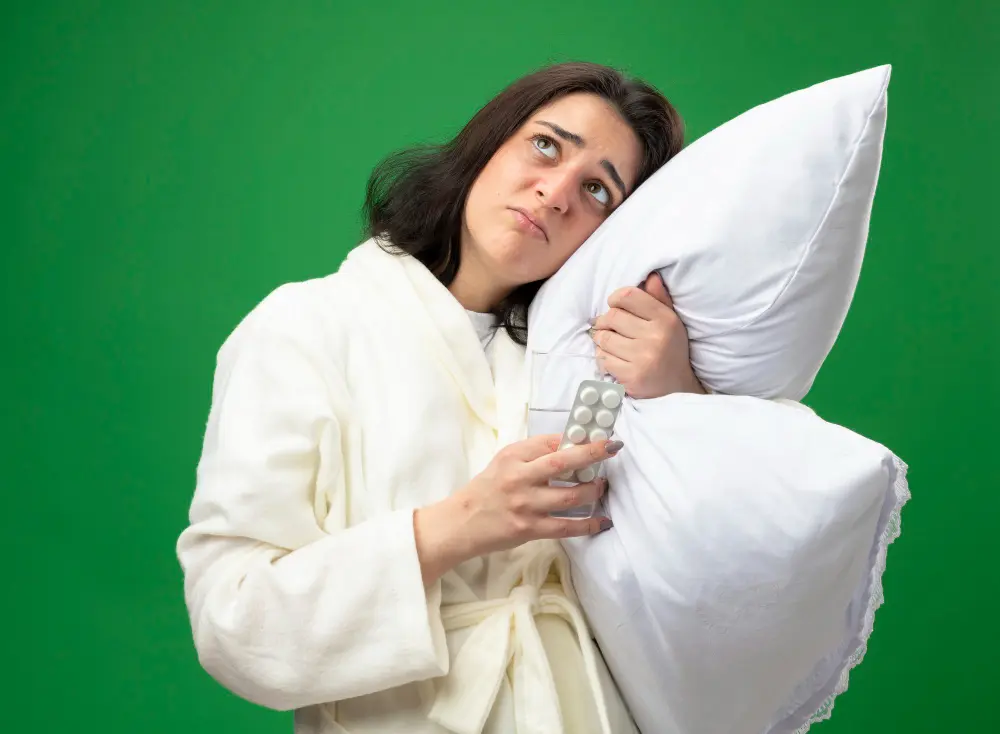 Person lying awake due to stress and poor sleep