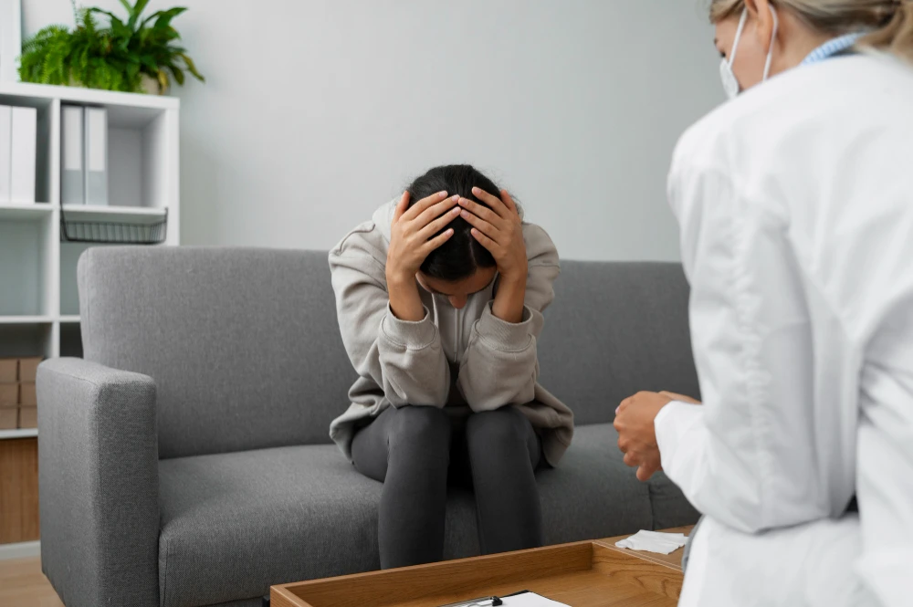 Woman experiencing stress and nervous system imbalance symptoms
